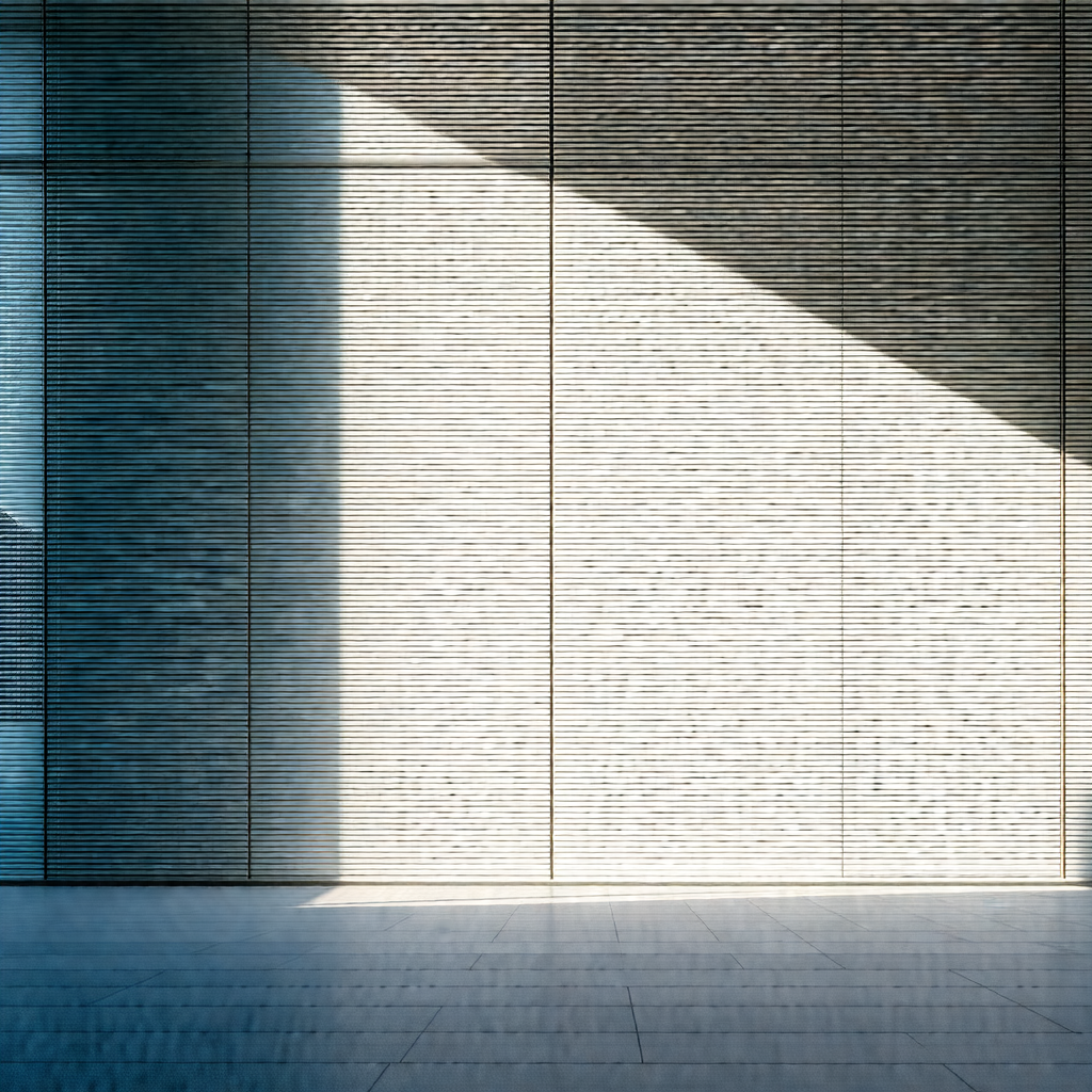 Large, empty room with a white wall