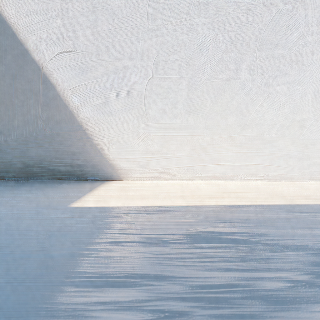 Large white wall with a shadow cast on it