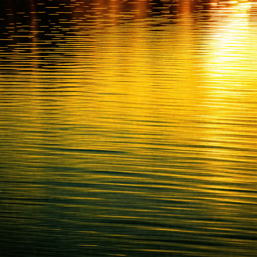 Serene lake with a beautiful sunset in the background