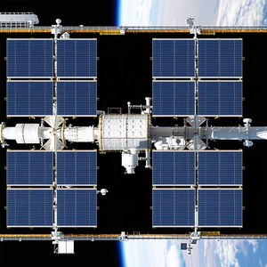 A Large Space Station With A Prominent Solar Panel On Its Side