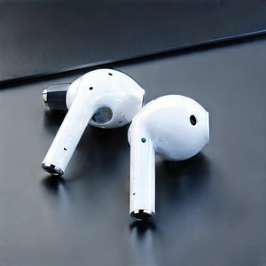 Wireless Earbuds With Streaming Content With White Apple