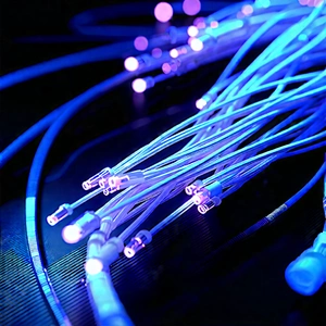 Close-up Of Fiber Optic Cables With Blue Light