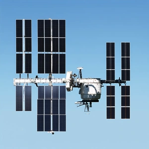 A Large Space Shuttle With A White And Blue Color Scheme, Floating In The Air