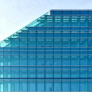 Urban Advertising Photography: Glass office tower with minimalist design