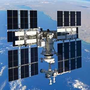 A Large Space Station With A White And Blue Color Scheme