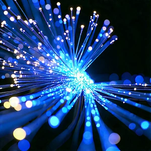 Close-up Of Fiber Optic Cables With Blue Light