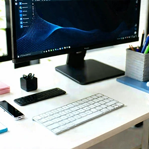 Business Commercial Photography: Workplace with productivity tools on desk
