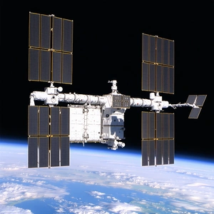 A Large Spacecraft With A White And Black Color Scheme, Floating In The Sky