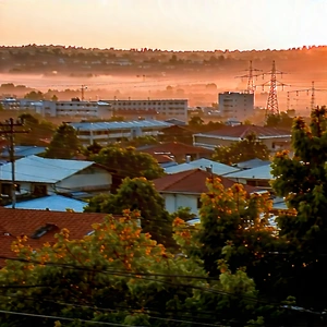 Urban Macro Photography: Cityscape Of Small Town During Sunset With Beautiful Sunset