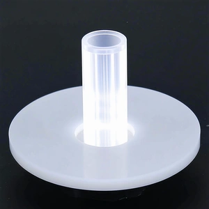 A White Light Bulb Is Sitting On A White Base