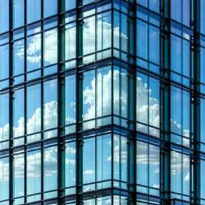 Urban Long Exposure Photography: Glass office tower with artistic facade