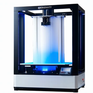 A Large Blue And White Machine Is Sitting On A White Table