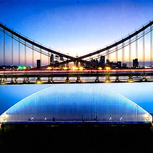 Urban Drone Photography: Iconic Bridge With City Lights With Large Bridge