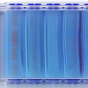A Blue Plastic Container Is Filled With A Series Of Blue And Red Stripes