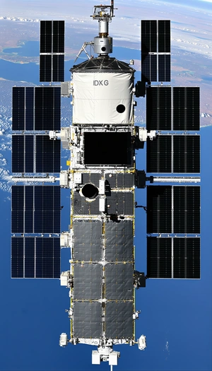 A Space Shuttle Is Shown In A Close-up View, With Its Hatch Open