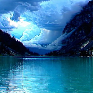 Nature Advertising Photography: Storm Clouds Over Alpine Lake With Serene Lake