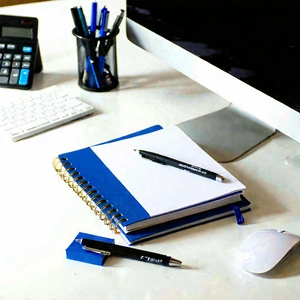 Business Commercial Photography: Workplace with notebooks and pens on desk