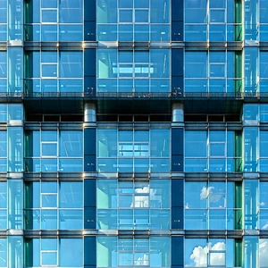 Urban Macro Photography: Glass office tower with artistic facade