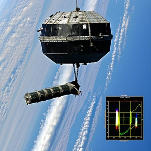 A Large Spacecraft Is Being Lifted Into The Air By A Crane