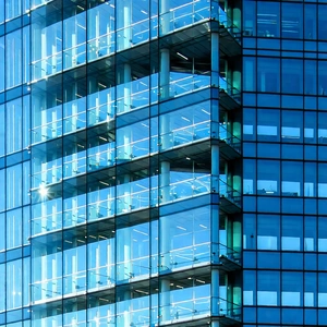 Urban Editorial Photography: Glass office tower with artistic facade