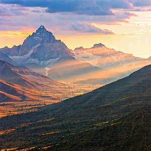 Nature Stock Photography: Mountain range during sunrise