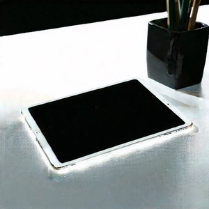 Tablet With Streaming Content With White Table