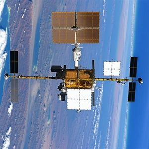 A Space Shuttle Flying High In The Sky