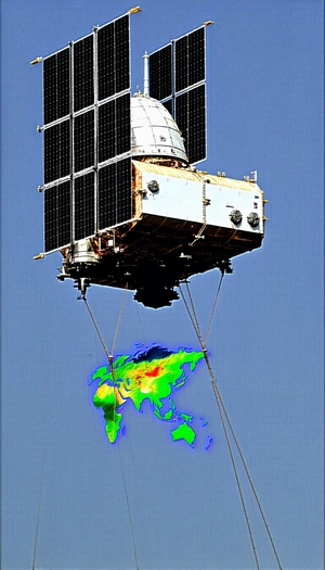 A Large Satellite Is Being Lifted Into The Air By A Crane