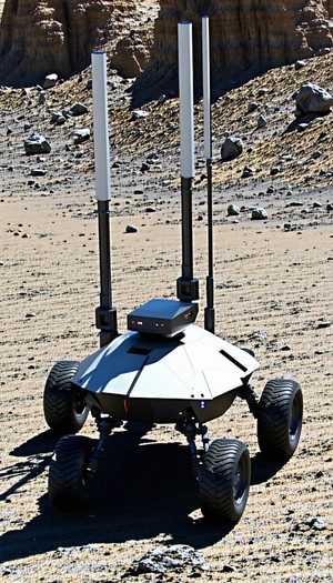 A Robotic Vehicle With A Large Antenna On Top Of It
