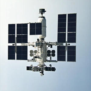 A Space Shuttle Is Flying Through The Sky, With Its Solar Panels Open