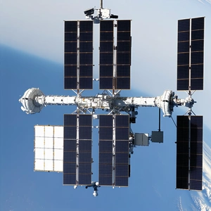 A Large Space Station With A Solar Panel Array On Its Side