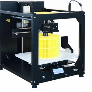 A Black And Yellow 3d Printer Is Sitting On A White Table
