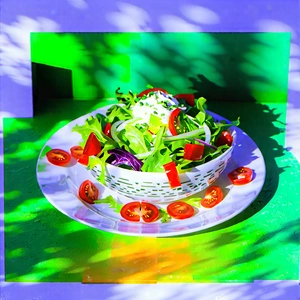 Lifestyle Drone Photography: Fresh Salad Prepared With Vibrant Colors With White Plate