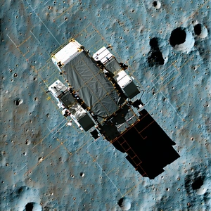 A Spacecraft Is Seen On The Moon, With A Large Black Cover On It