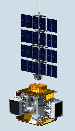 A Large Solar Panel Array Mounted On A Tower