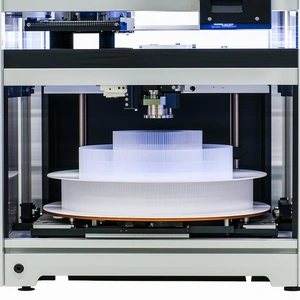 A Machine Is Making A Plastic Disc