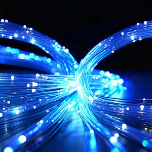 Close-up Of Fiber Optic Cables With Blue Light