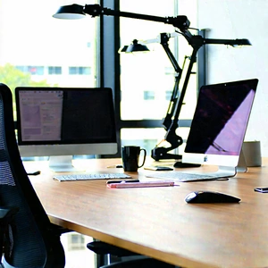 Business Drone Photography: Workplace With Digital Devices On Desk With Wooden Desk