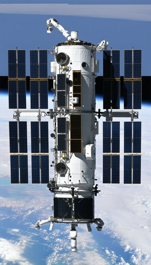 A Large Spacecraft With A Prominent Solar Panel Array On Its Side