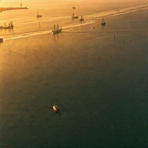 Urban Editorial Photography: Aerial View Of Harbor District With Boat Floating