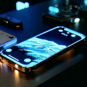 Tech Aerial Photography: Smartphone With Glowing Screen With Table Cell