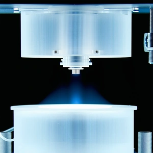 A Large, Clear Glass Dome Is Sitting On A Table