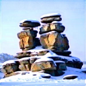 Nature Professional Photography: Rock Formation In Winter Snow With Large Rock