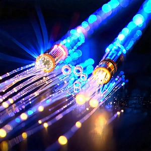 Close-up Of Fiber Optic Cables With Blue Light