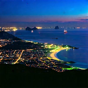 Urban Stock Photography: Cityscape Of Coastal City During Night With Captures Beautiful