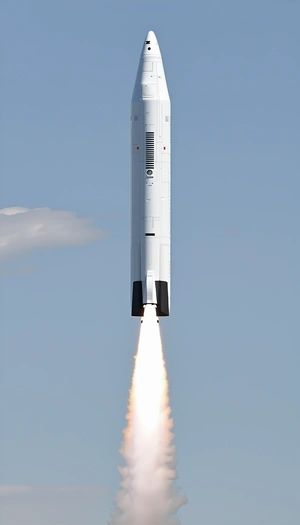 A Rocket Is Seen In The Sky, With Its Tail End Visible