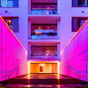 Urban Professional Photography: Modern Apartment Complex With Minimalist Design With Long Hallway