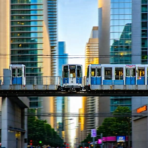 Urban Drone Photography: City Tram In Financial District With Train Traveling