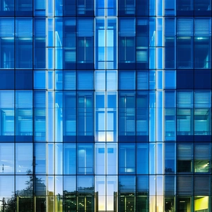 Urban Minimalist Design: Glass Office Tower With Artistic Facade With Tall Building