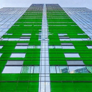 Urban Tilt-shift Photography: Skyscraper With Green Rooftop With Large Green
